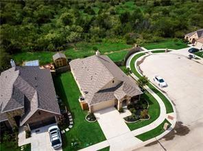11204 Meredith Drive Frisco, TX 75036 - Photo 24 of 30 **A MUST-SEE! Serene Views of the Woods – Nature Lover’s Dream!**Escape the hustle and unwind in this adorable one-story home backing directly to a nature reserve—your personal stress-buster with endless views of lush woods. Nestled on an oversized cul-de-sac lot in a small, gated community, this property offers privacy, tranquility, and a connection to nature that’s hard to find.