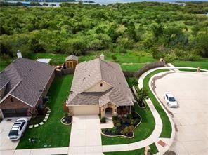 11204 Meredith Drive Frisco, TX 75036 - Photo 25 of 30 **A MUST-SEE! Serene Views of the Woods – Nature Lover’s Dream!**Escape the hustle and unwind in this adorable one-story home backing directly to a nature reserve—your personal stress-buster with endless views of lush woods. Nestled on an oversized cul-de-sac lot in a small, gated community, this property offers privacy, tranquility, and a connection to nature that’s hard to find.