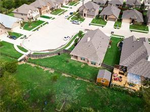 11204 Meredith Drive Frisco, TX 75036 - Photo 26 of 30 **A MUST-SEE! Serene Views of the Woods – Nature Lover’s Dream!**Escape the hustle and unwind in this adorable one-story home backing directly to a nature reserve—your personal stress-buster with endless views of lush woods. Nestled on an oversized cul-de-sac lot in a small, gated community, this property offers privacy, tranquility, and a connection to nature that’s hard to find.