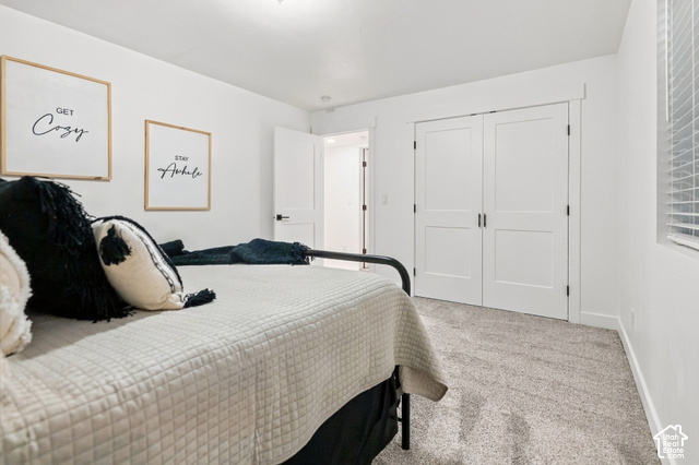 244 East Sevier River Road Central Valley, UT 84754 - Photo 64 of 66 Soft textured carpeting, white painted walls, and a window with horizontal blinds