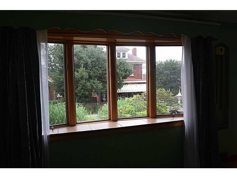 1305 Pine Hollow Road McKees Rocks, PA 15136 - Photo 11 of 25 Living Room. Great front window with ledge for house plants to thrive!