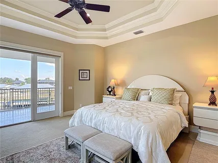 a view of a swimming pool with an outdoor seating and a garden