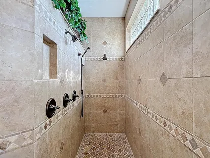 a front view of building with yellow lighting