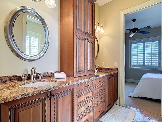 a front view of a house with a yard table and chairs