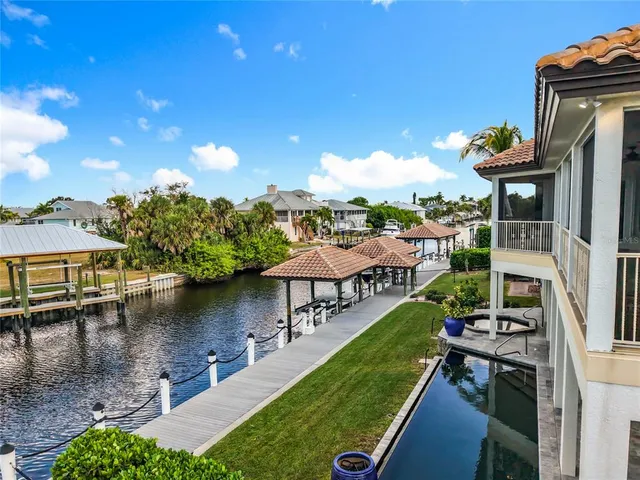 an aerial view of a house with swimming pool