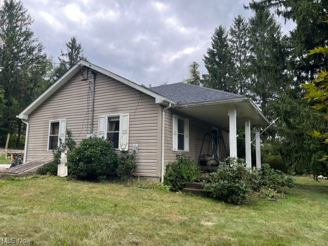 2360 Sheperds Valley Road New Cumberland, WV 26047 - Photo 14 of 16 View of side of property featuring a yard
