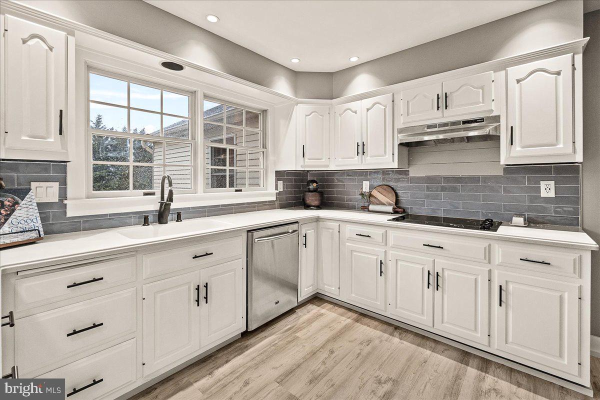 8433 Fingerboard Road Frederick, MD 21704 - Photo 11 of 42 a kitchen with cabinets appliances a sink and a window