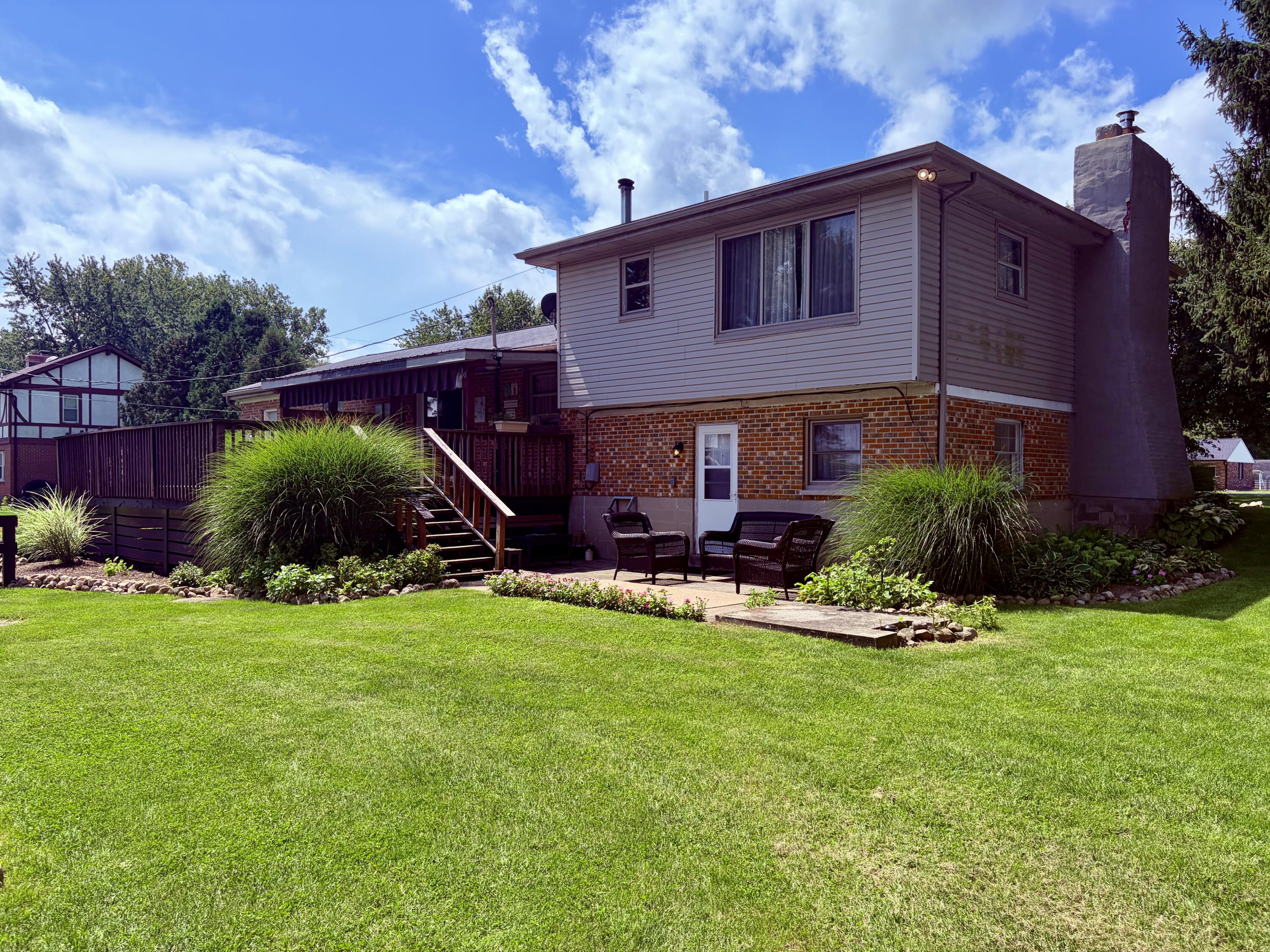 5606 Middle Urbana Road Springfield, OH 45502 - Photo 23 of 78 Back side of home looking toward patio.