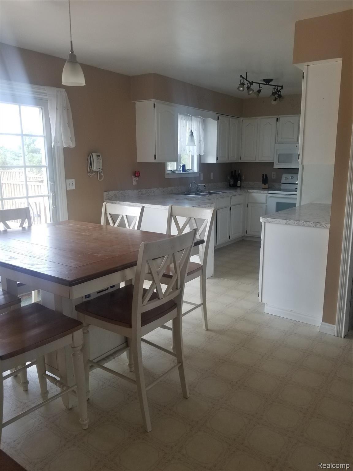 13690 Burt Road Capac, MI 48014 - Photo 4 of 14 burt kitchen dining.jpg