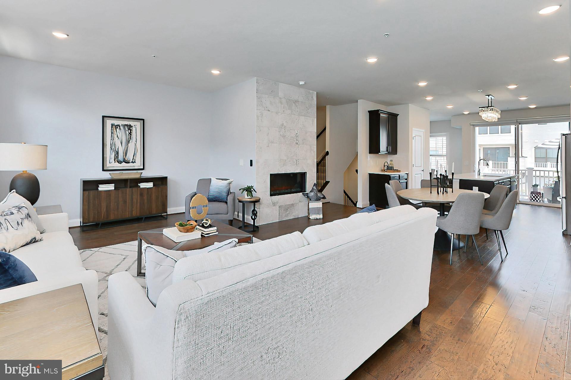 22574 Windsor Locks Square Ashburn, VA 20148 - Photo 13 of 51 Opens into the Dining Area, Chefs Kitchen and Deck