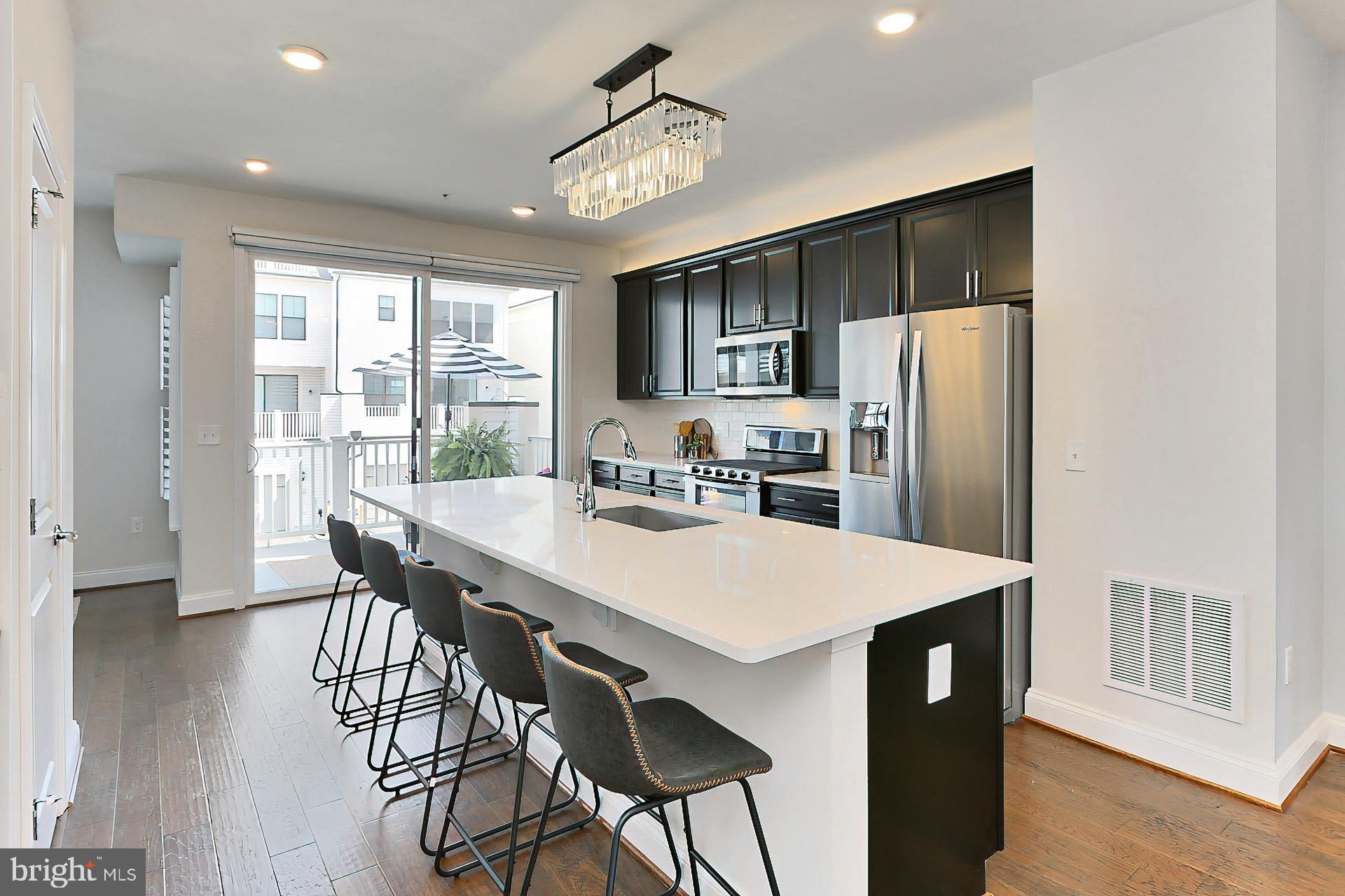 22574 Windsor Locks Square Ashburn, VA 20148 - Photo 15 of 51 Check Out that ISLAND!!! Motorized Shades at SGD