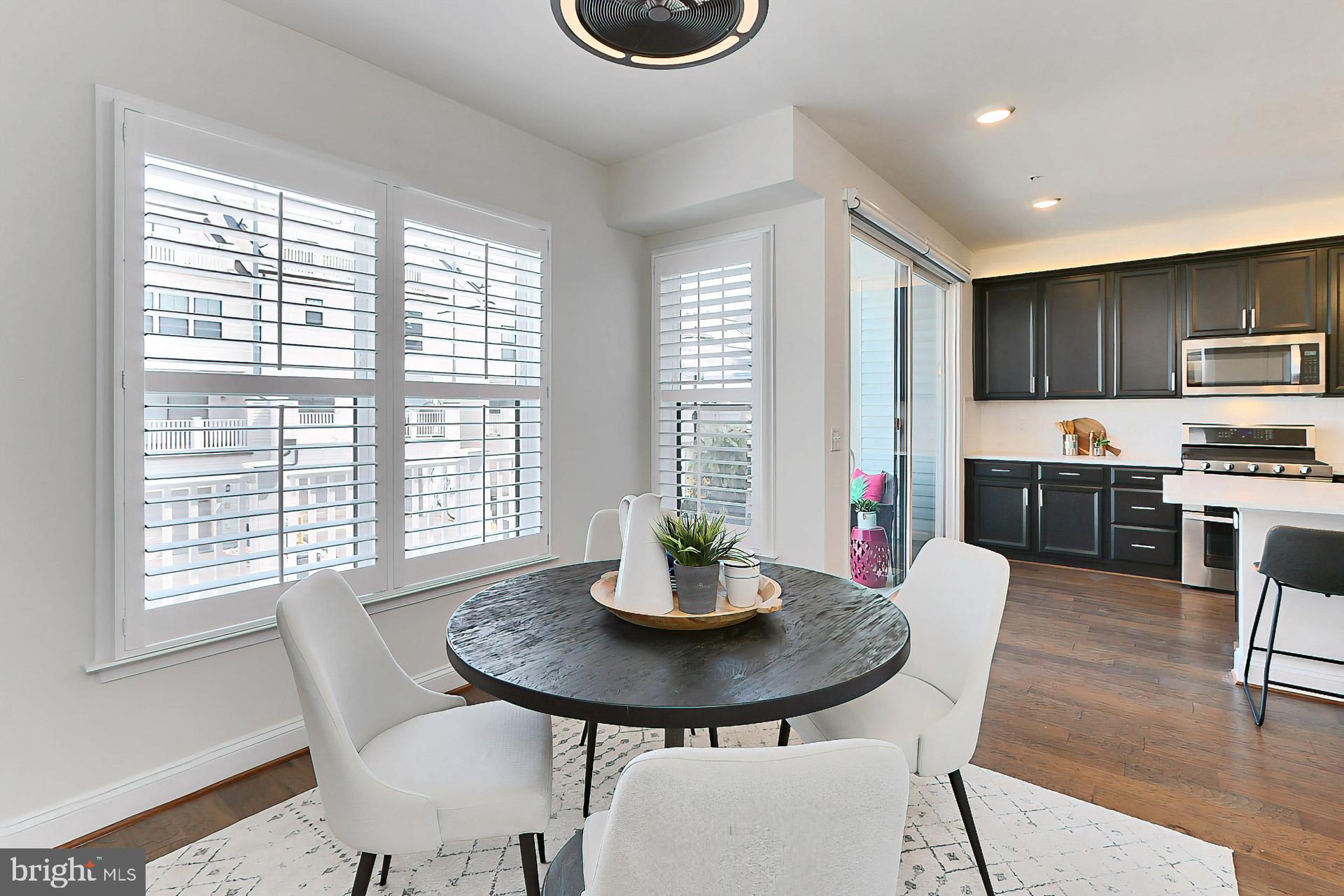 22574 Windsor Locks Square Ashburn, VA 20148 - Photo 22 of 51 Tons of Windows and a Lighted Ceiling Fan