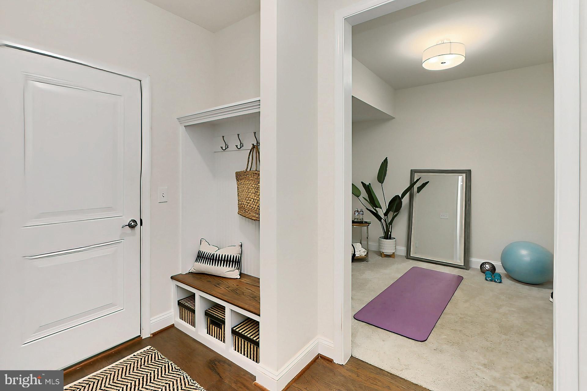 22574 Windsor Locks Square Ashburn, VA 20148 - Photo 7 of 51 Custom Built In Bench w/ Hooks + Walk In Closet