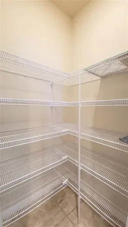 a view of a room with racks on the wall