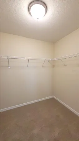 a view of a room with racks on the wall
