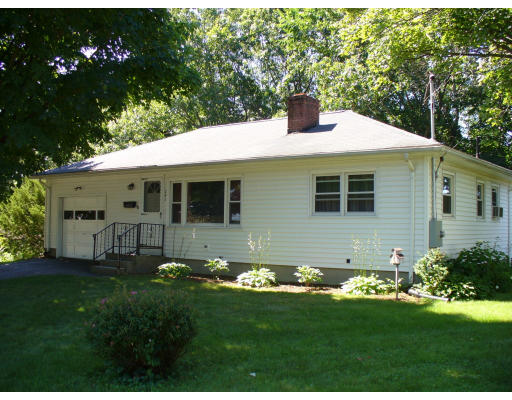 291 Barker Street Three Rivers, MA 01080 - Photo 1 of 1 a front view of a house with a garden