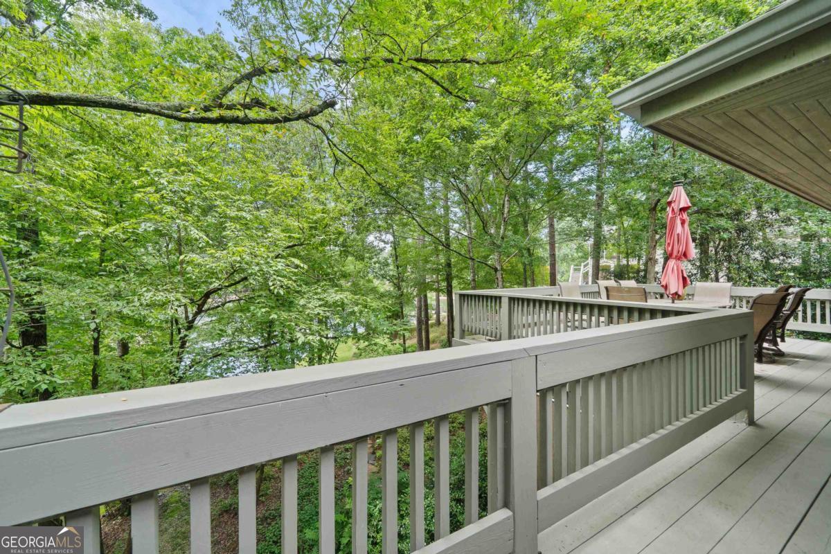 1031 Old Still Road Greensboro, GA 30642 - Photo 44 of 73 a view of a balcony with chairs