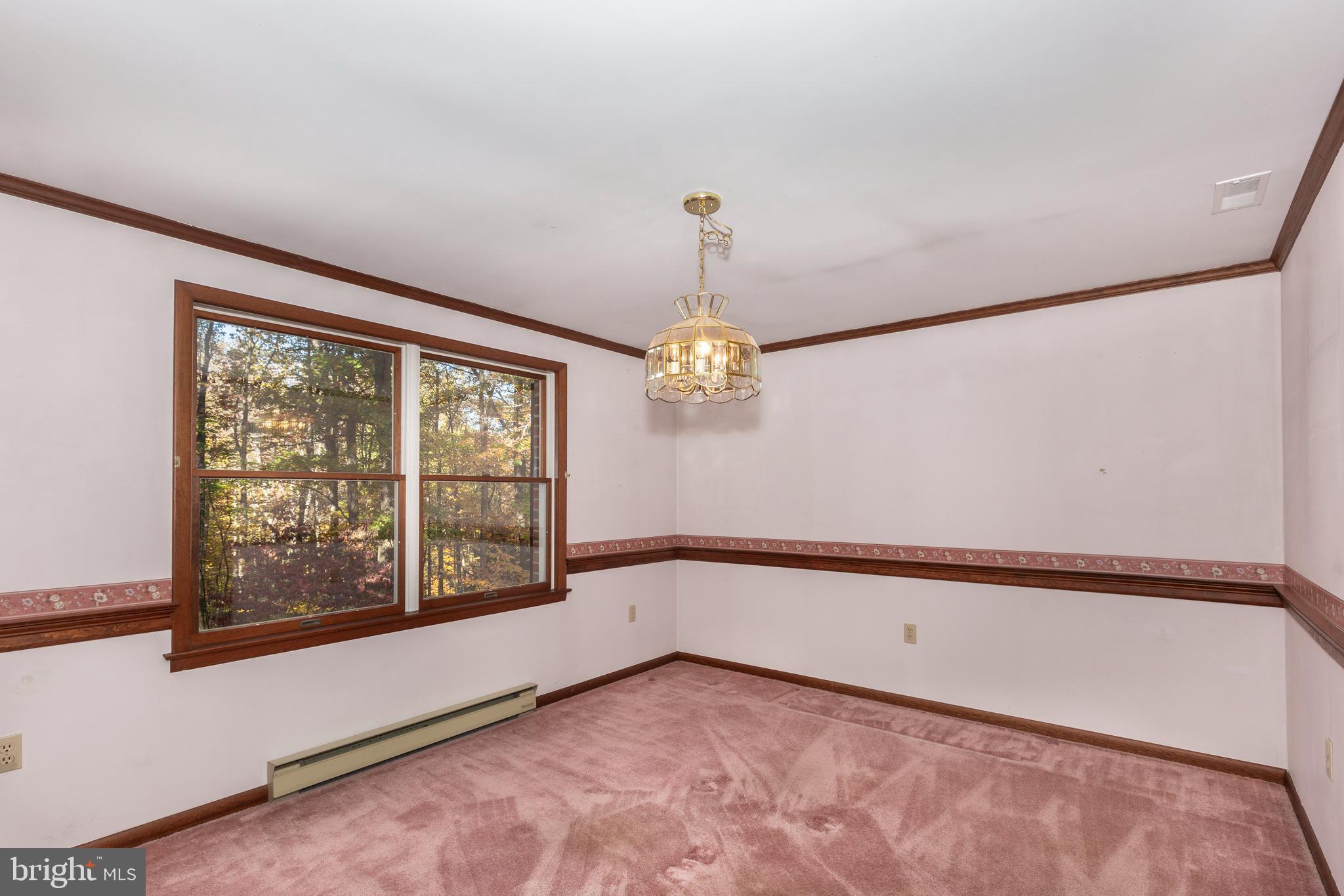 3870 Roop Road New Windsor, MD 21776 - Photo 11 of 59 a view of an empty room with a window