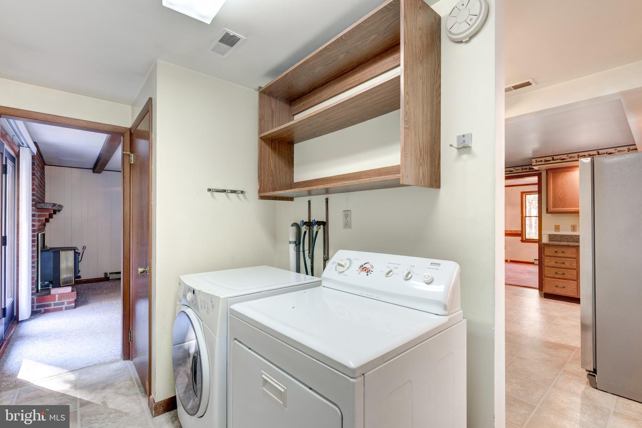3870 Roop Road New Windsor, MD 21776 - Photo 23 of 59 a utility room with dryer and washer