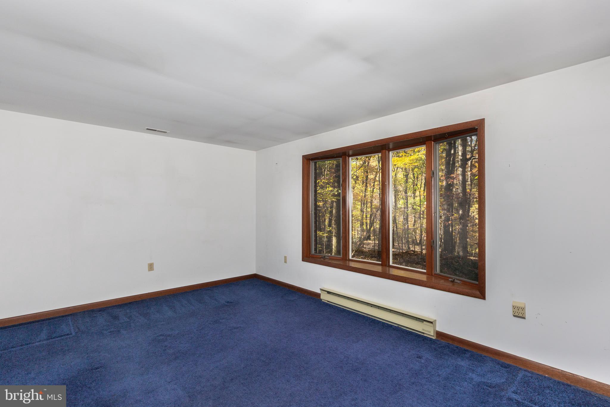 3870 Roop Road New Windsor, MD 21776 - Photo 27 of 59 an empty room with window