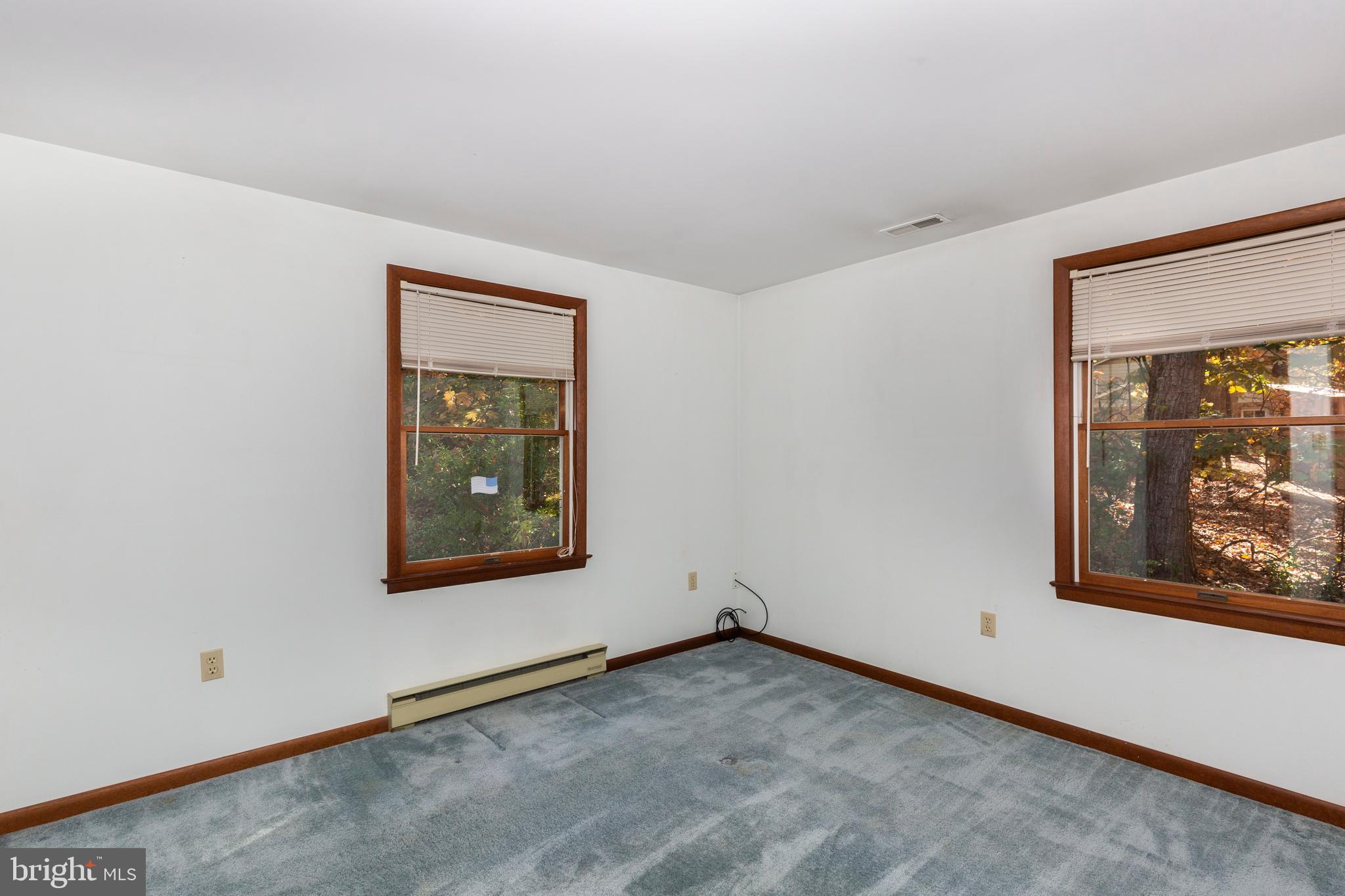 3870 Roop Road New Windsor, MD 21776 - Photo 31 of 59 an empty room with windows
