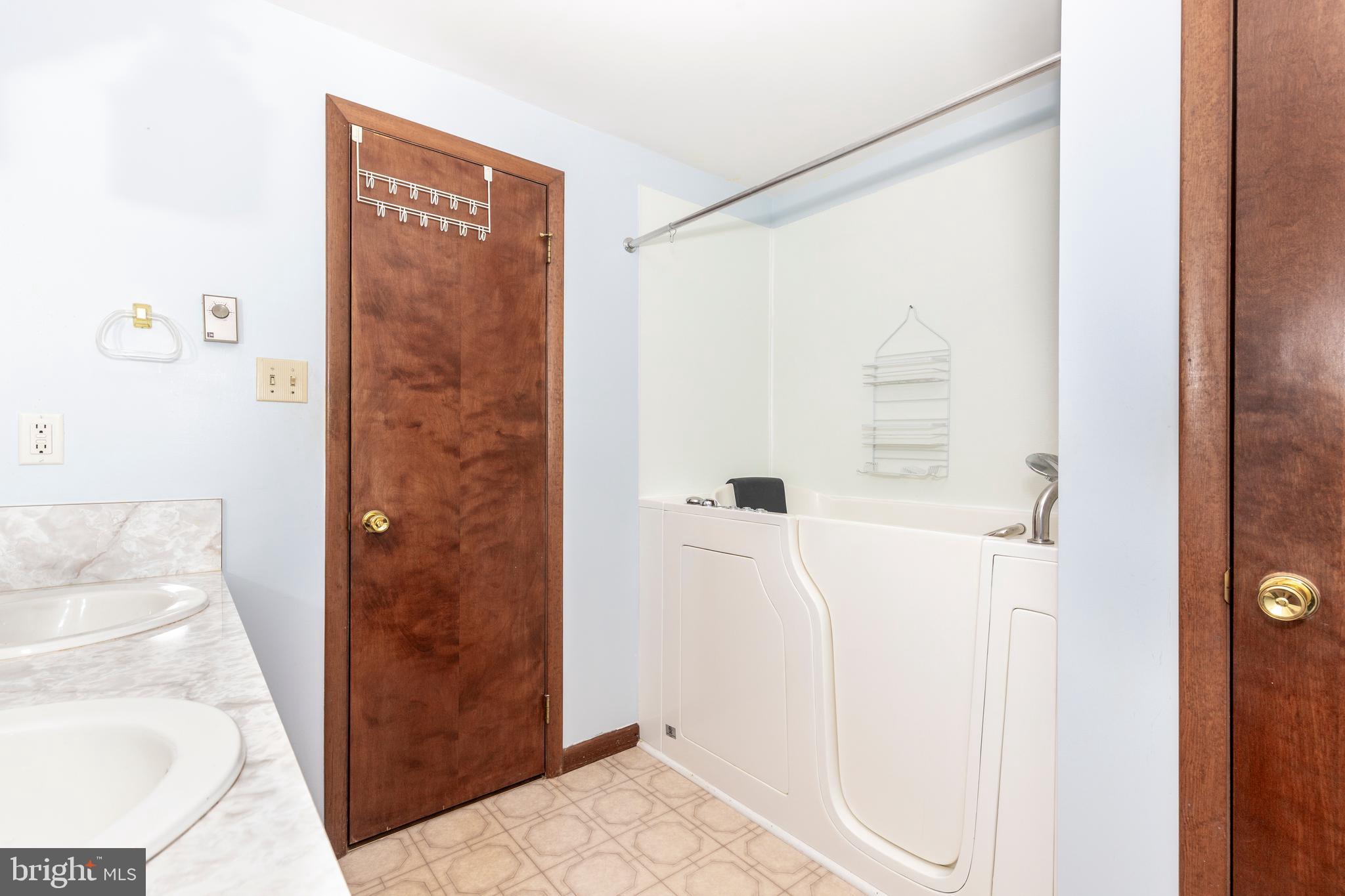 3870 Roop Road New Windsor, MD 21776 - Photo 36 of 59 a bathroom with a shower and a sink