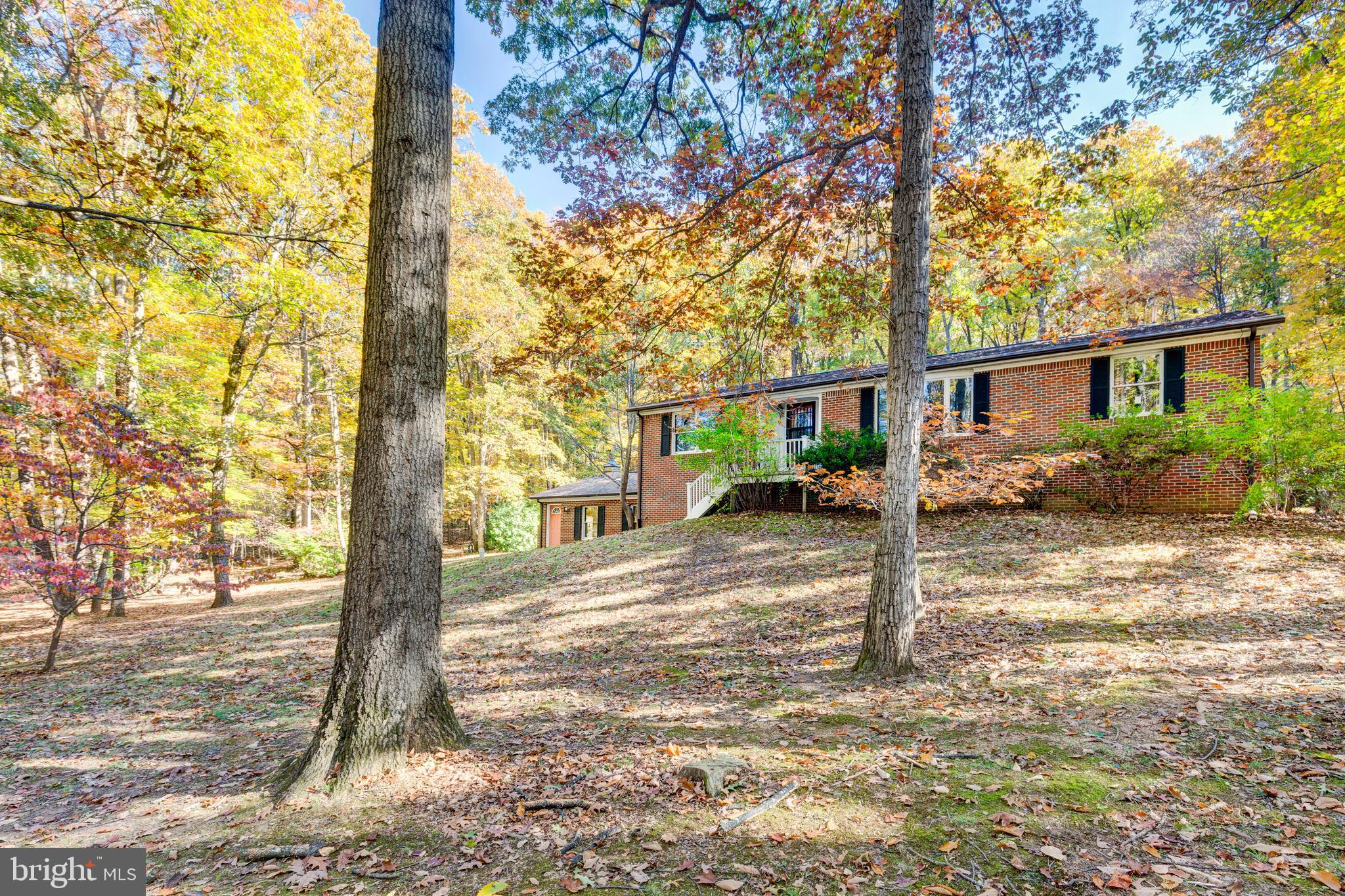 3870 Roop Road New Windsor, MD 21776 - Photo 46 of 59 a view of a house with a tree in front