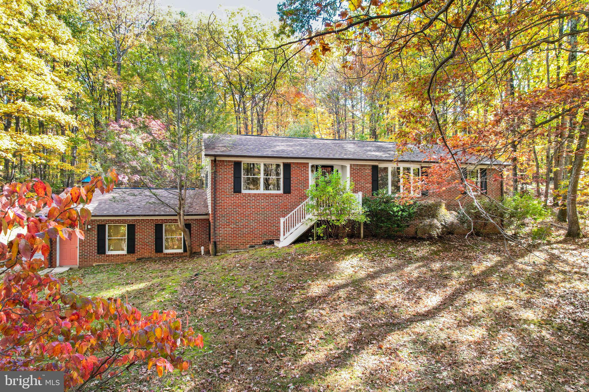 3870 Roop Road New Windsor, MD 21776 - Photo 7 of 59 front view of house with a yard