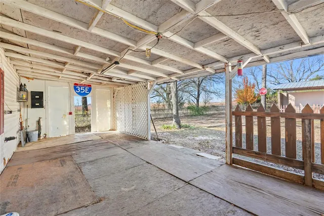 a view of porch with furniture