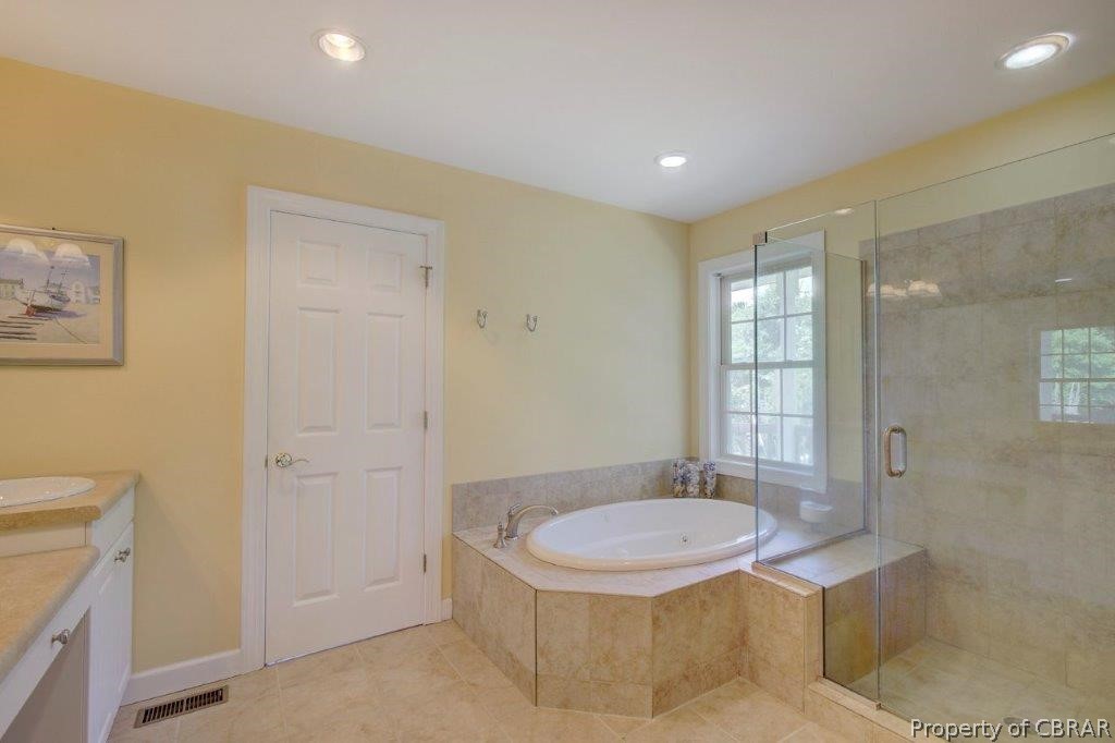 2069 Jenkins Neck Road Hayes, VA 23072 - Photo 22 of 42 Primary Bedroom Bathroom