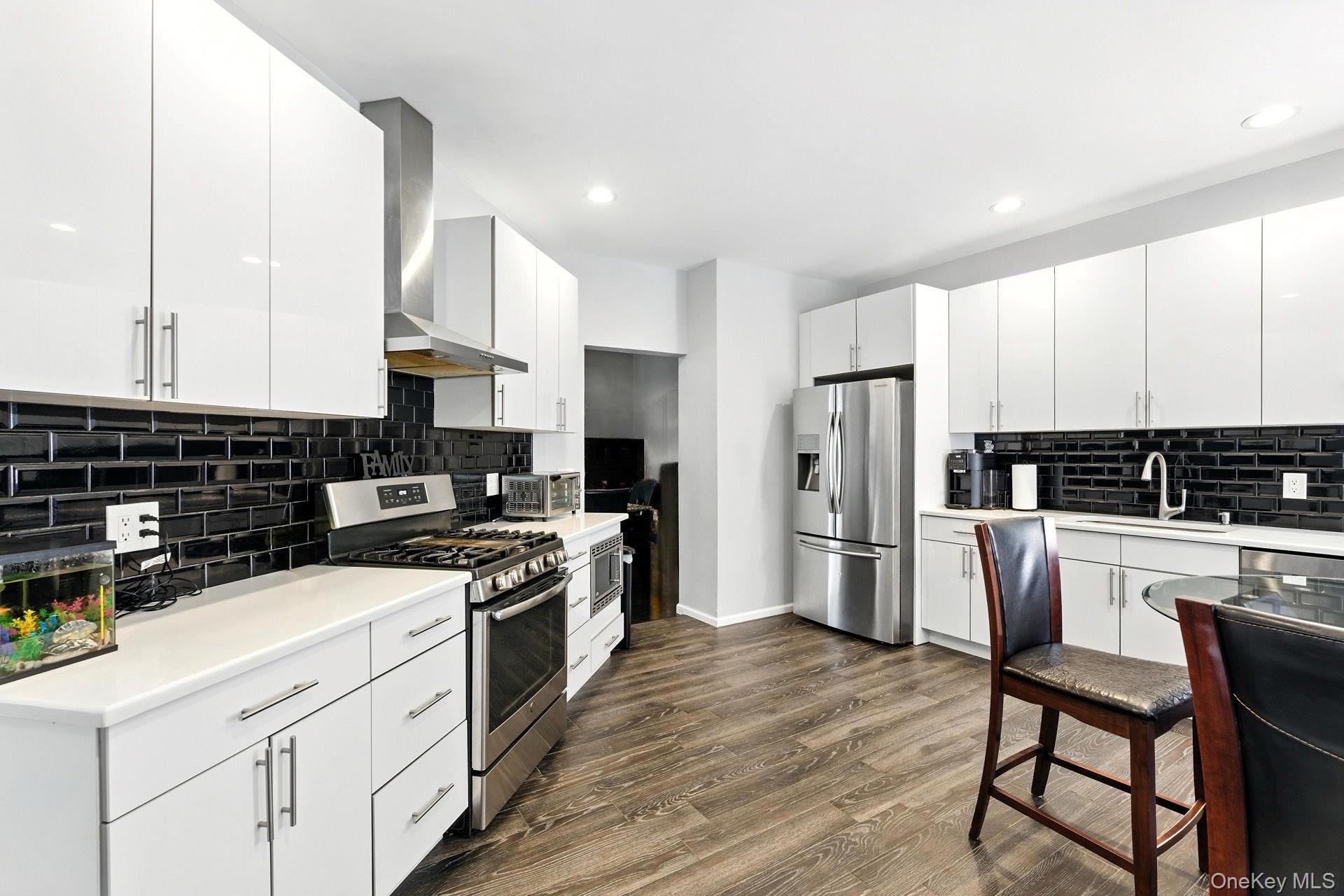 33 Sunflower Ridge Road Centereach, NY 11720 - Photo 4 of 20 Beautiful Chef's Kitchen with stainless steel appliances.