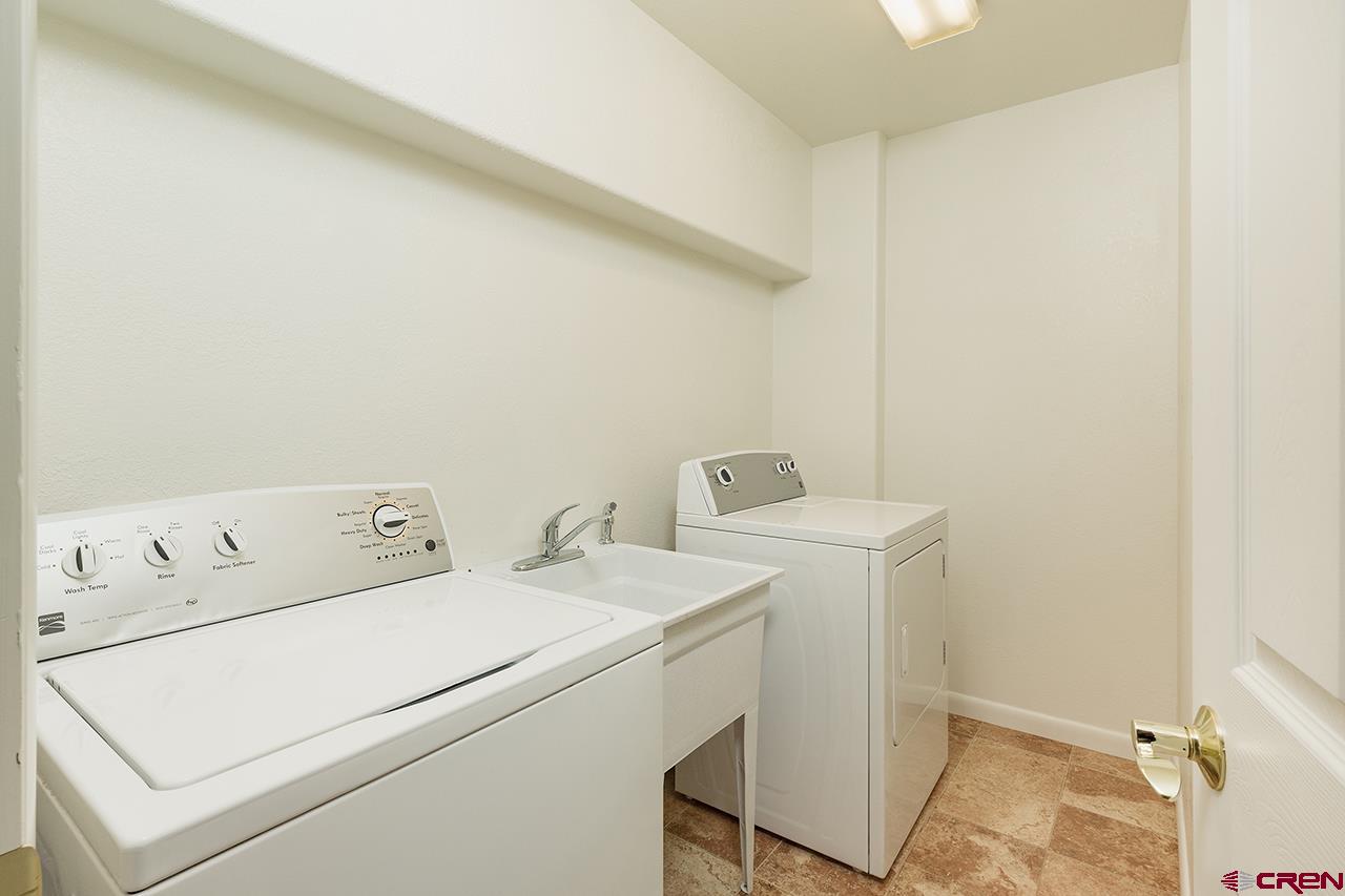 206 B Jenkins Ranch Road Durango, CO 81301 - Photo 23 of 27 a utility room with dryer and washer