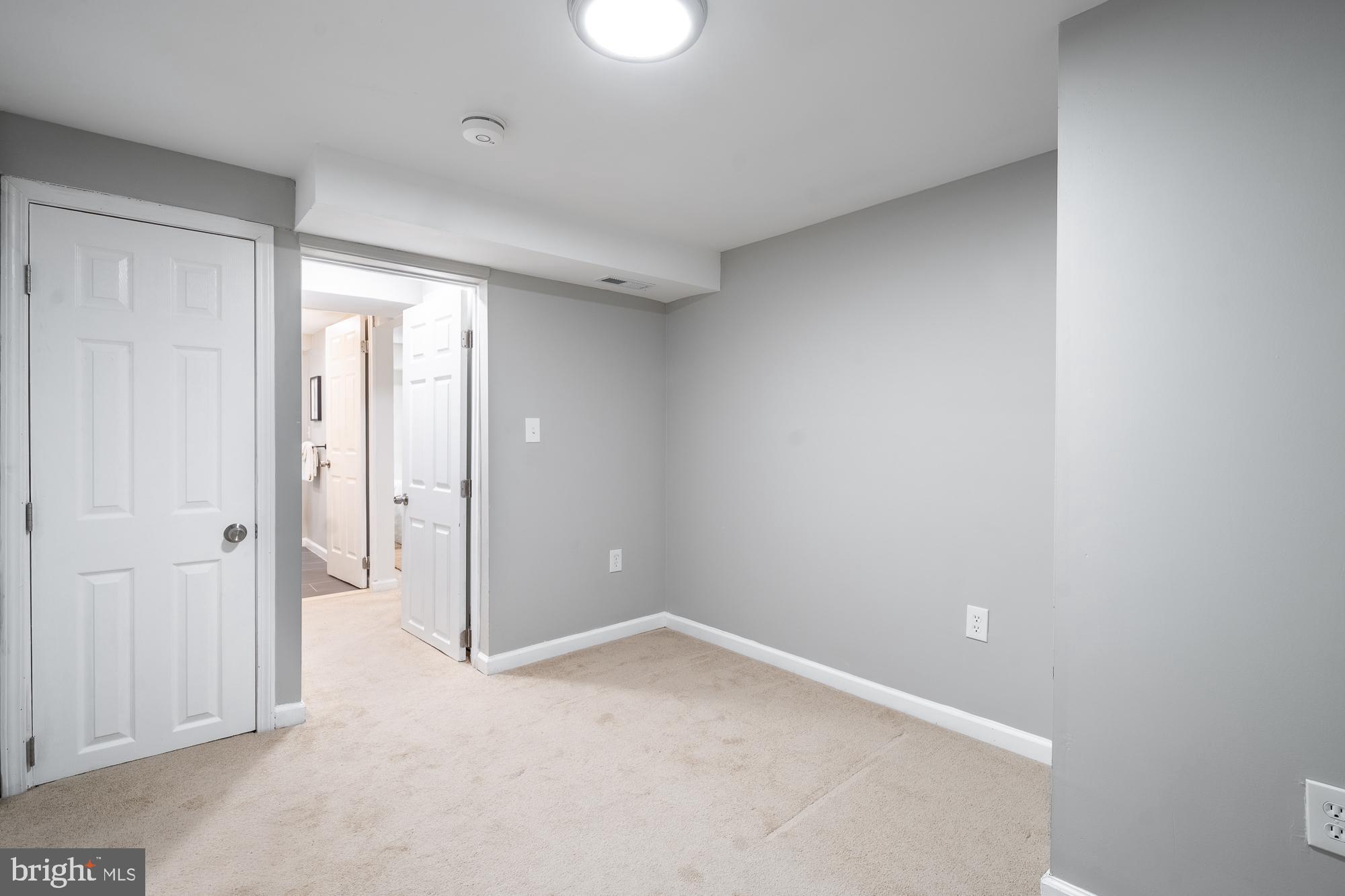 8705 Bradford Road Silver Spring, MD 20901 - Photo 31 of 35 Basement - Walkout door and 2nd bedroom