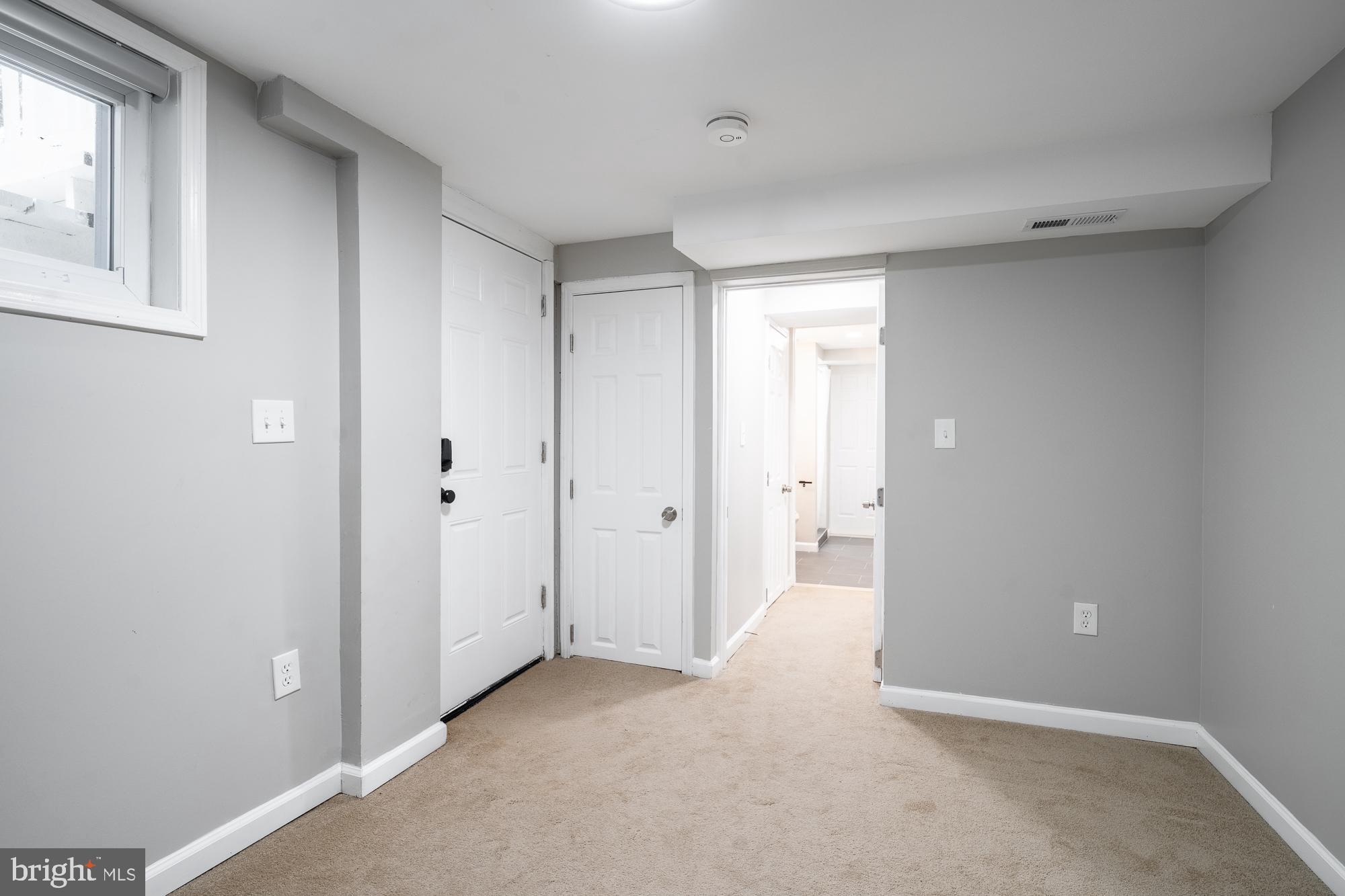 8705 Bradford Road Silver Spring, MD 20901 - Photo 32 of 35 Basement - Walkout door and 2nd bedroom