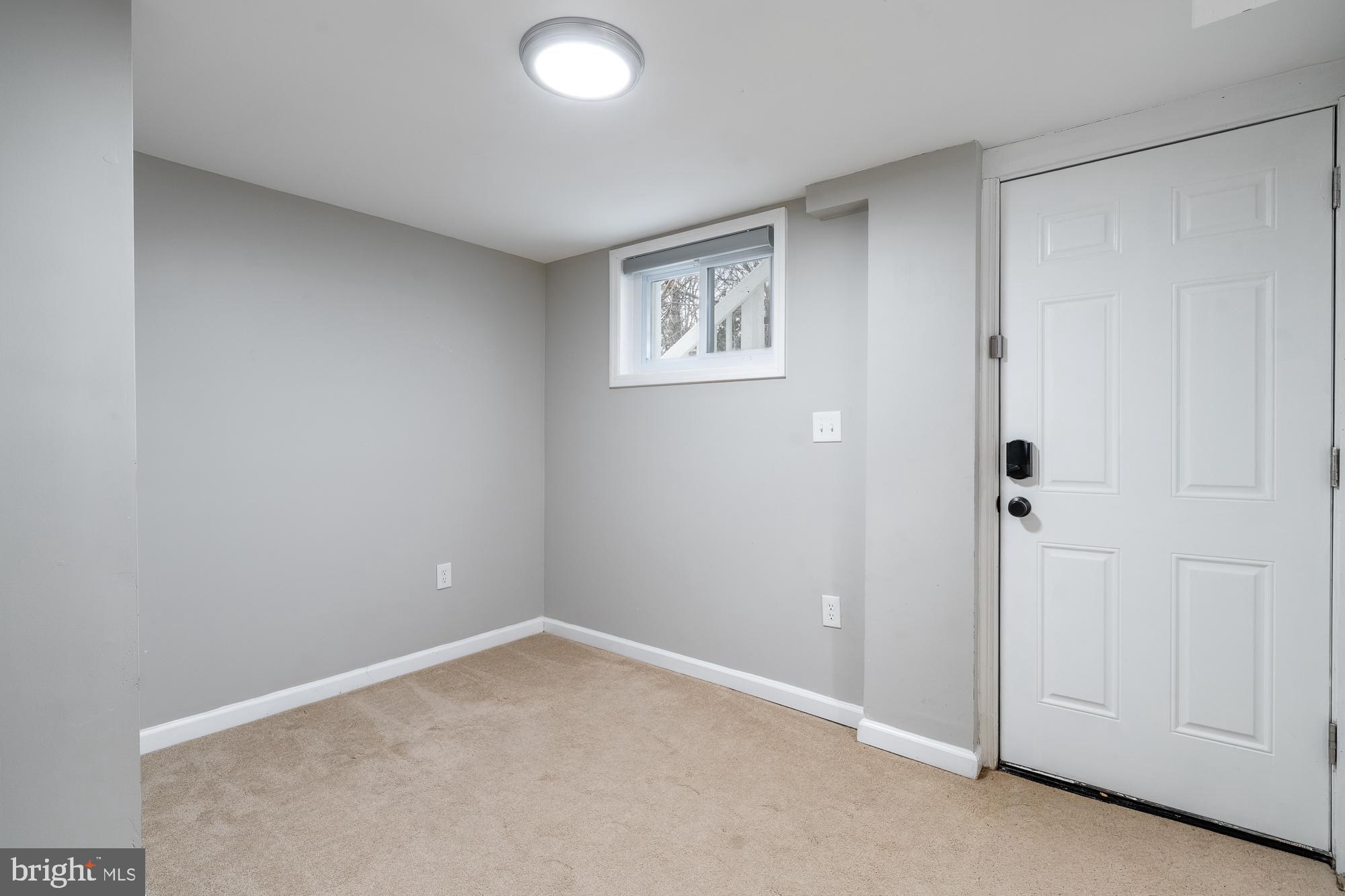 8705 Bradford Road Silver Spring, MD 20901 - Photo 33 of 35 Basement - Walkout door and 2nd bedroom