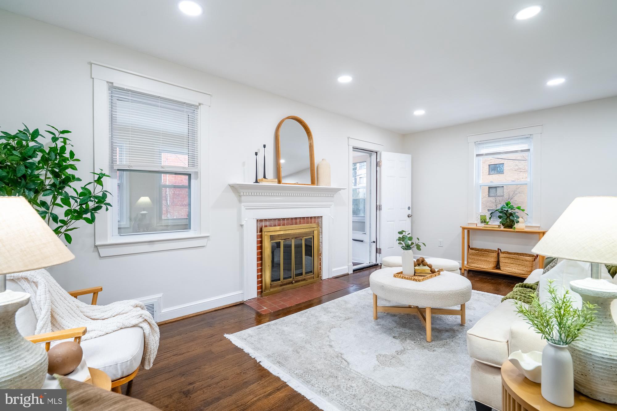 8705 Bradford Road Silver Spring, MD 20901 - Photo 5 of 35 1st Floor - Living space with fireplace