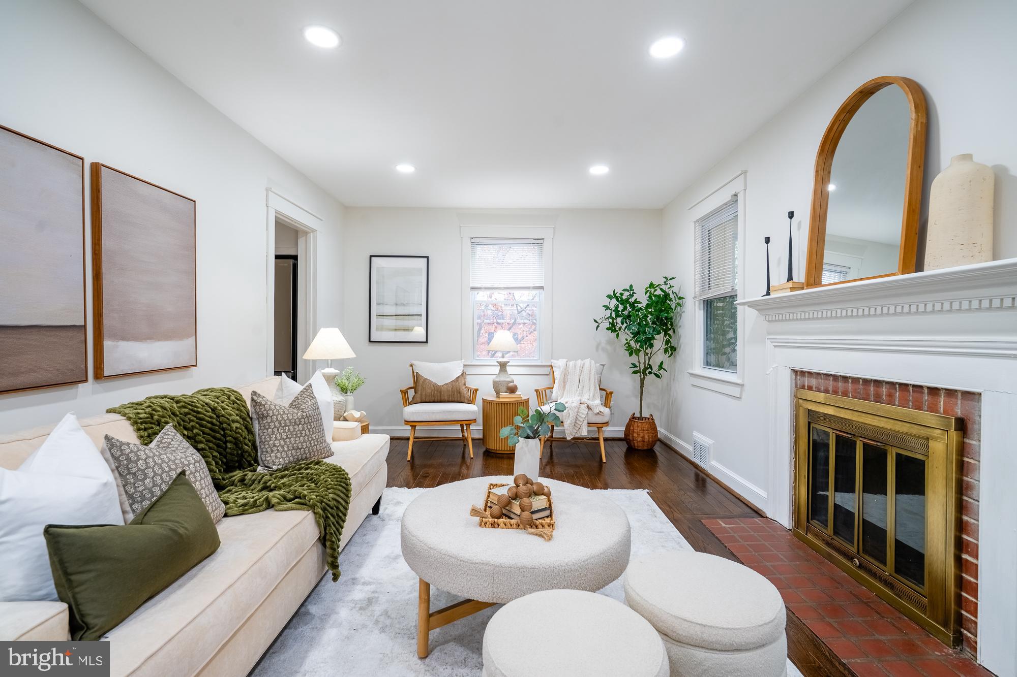 8705 Bradford Road Silver Spring, MD 20901 - Photo 6 of 35 1st Floor - Living space with fireplace