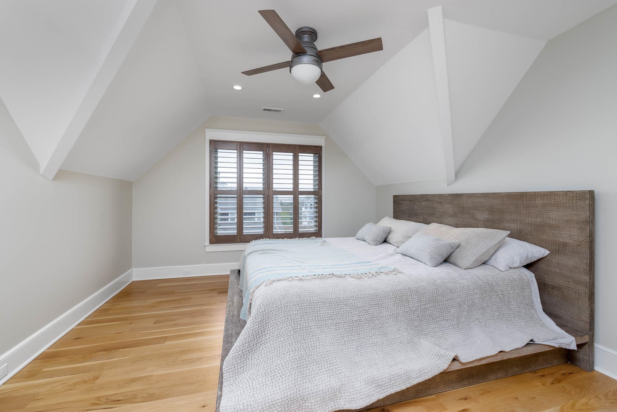 27 2nd Cape May, NJ 08204 - Photo 17 of 33 a bedroom with a bed and window