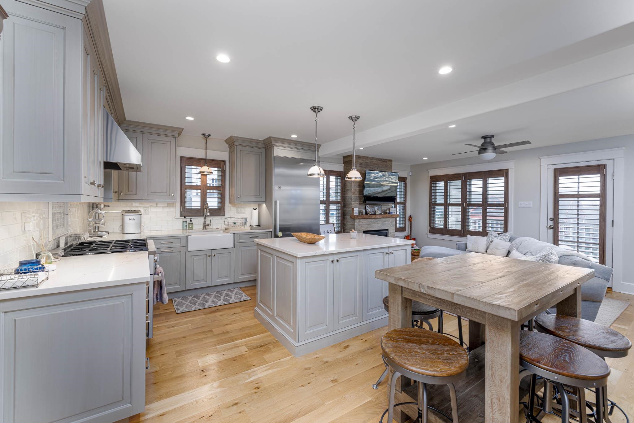 27 2nd Cape May, NJ 08204 - Photo 3 of 33 a kitchen with a table chairs stove and cabinets