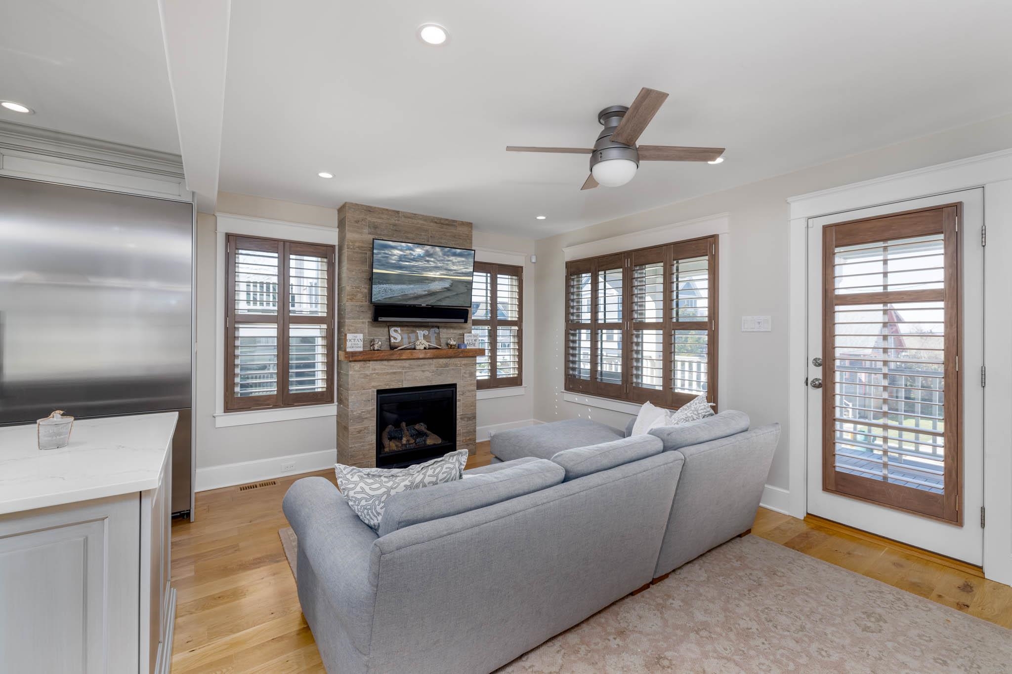 27 2nd Cape May, NJ 08204 - Photo 7 of 33 a living room with furniture and a fireplace