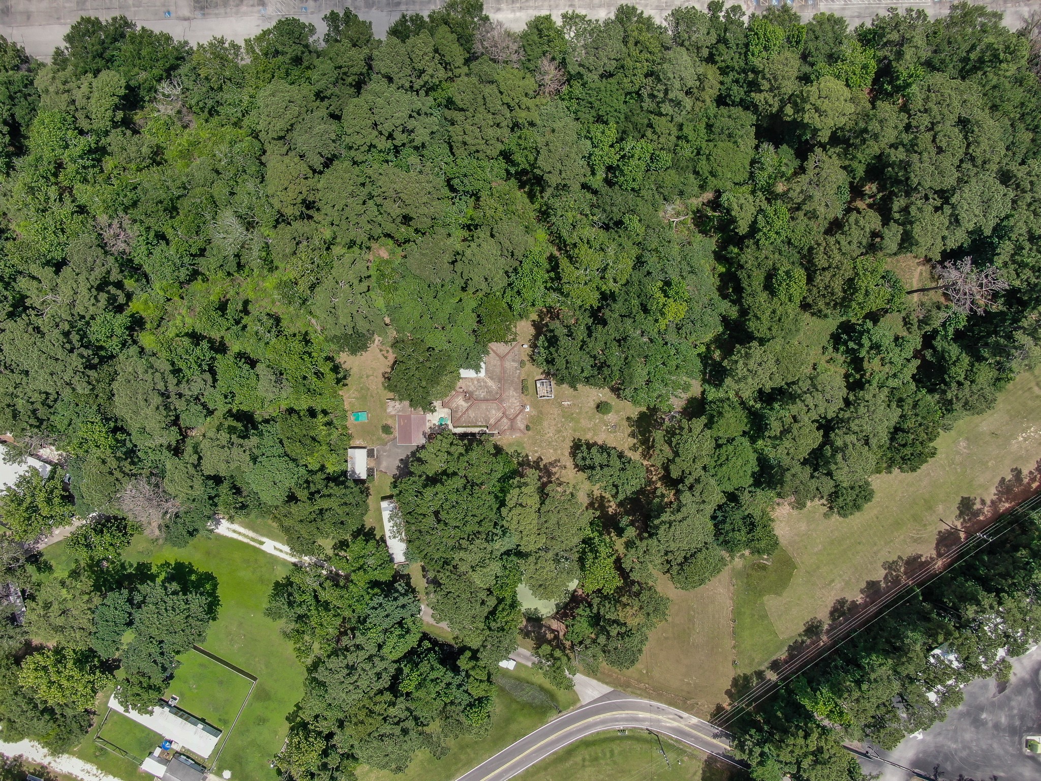 1251 Pruitt Road The Woodlands, TX 77380 - Photo 2 of 36 Lush beautiful lot in The Woodlands