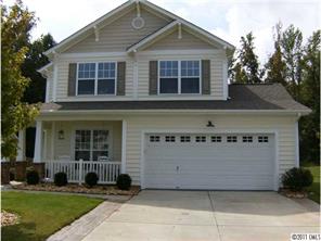 348 Sand Paver Way Fort Mill, SC 29708 - Photo 1 of 16 a front view of a house with a yard