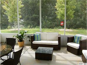 348 Sand Paver Way Fort Mill, SC 29708 - Photo 2 of 16 a view of a patio with couches chairs and a yard
