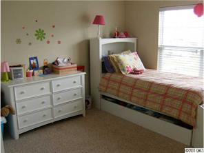 348 Sand Paver Way Fort Mill, SC 29708 - Photo 14 of 16 a bedroom with a bed and a window