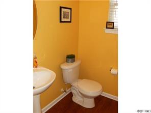 348 Sand Paver Way Fort Mill, SC 29708 - Photo 8 of 16 a bathroom with a toilet and a sink