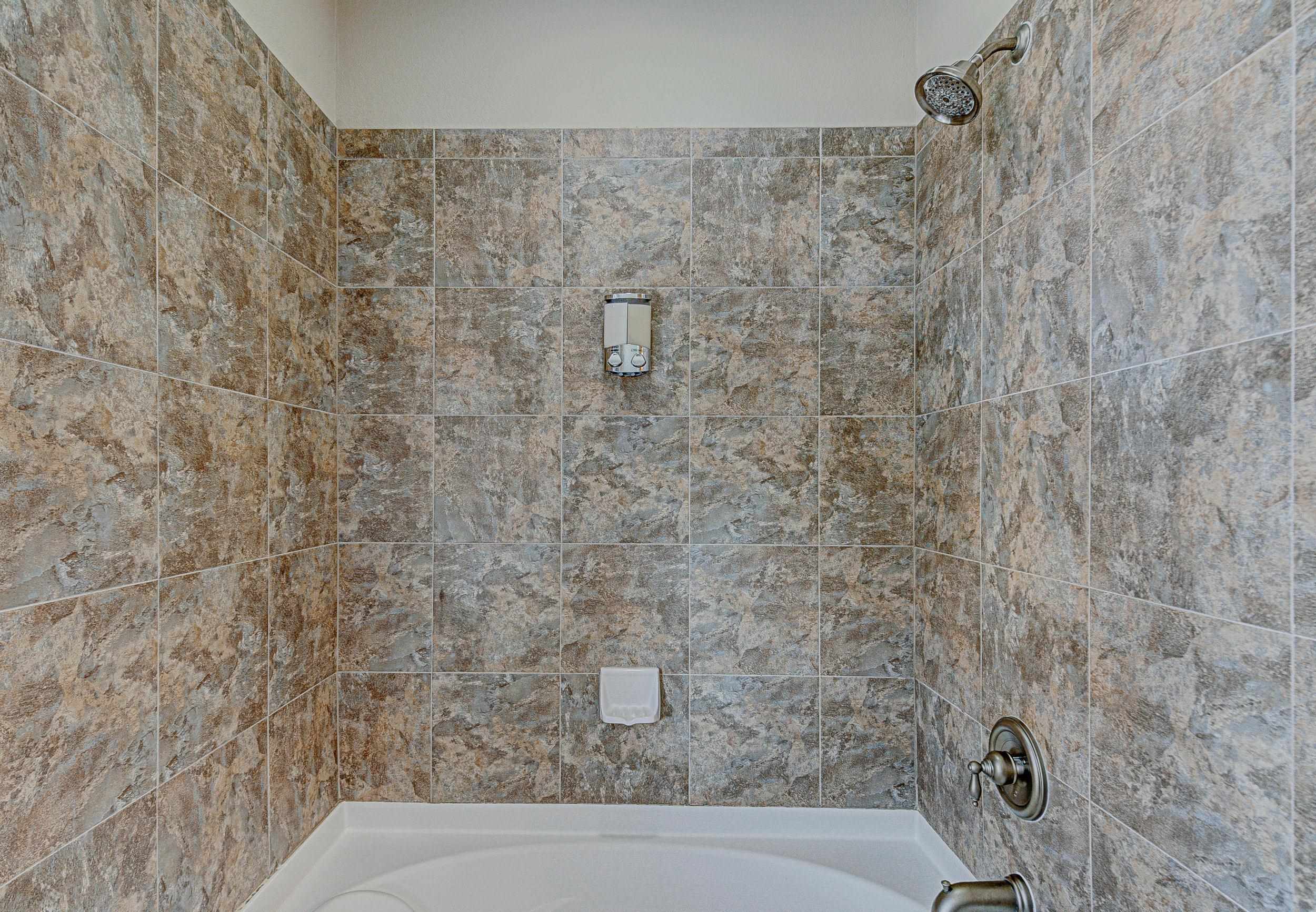 101 West Bank, Unit 51 Horseshoe Bay, TX 78657 - Photo 15 of 30 a bathroom with a bathtub