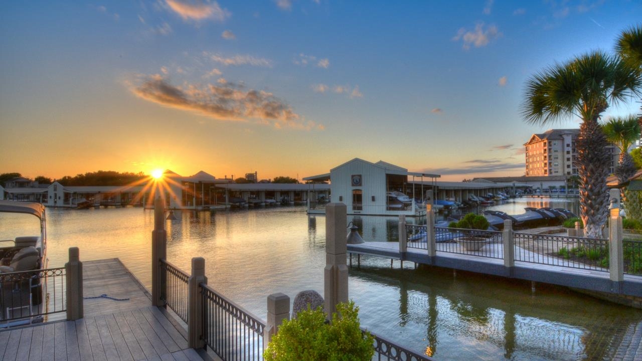 101 West Bank, Unit 51 Horseshoe Bay, TX 78657 - Photo 18 of 30 a view of a lake with a house