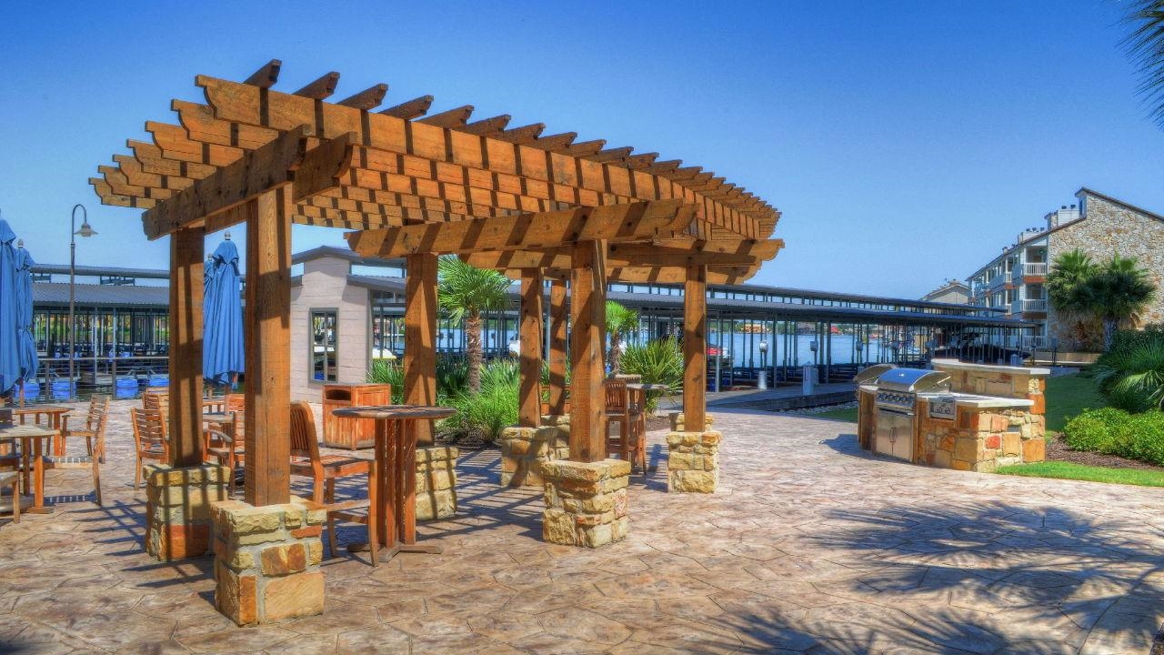 101 West Bank, Unit 51 Horseshoe Bay, TX 78657 - Photo 19 of 30 a view of a house with sitting area and furniture