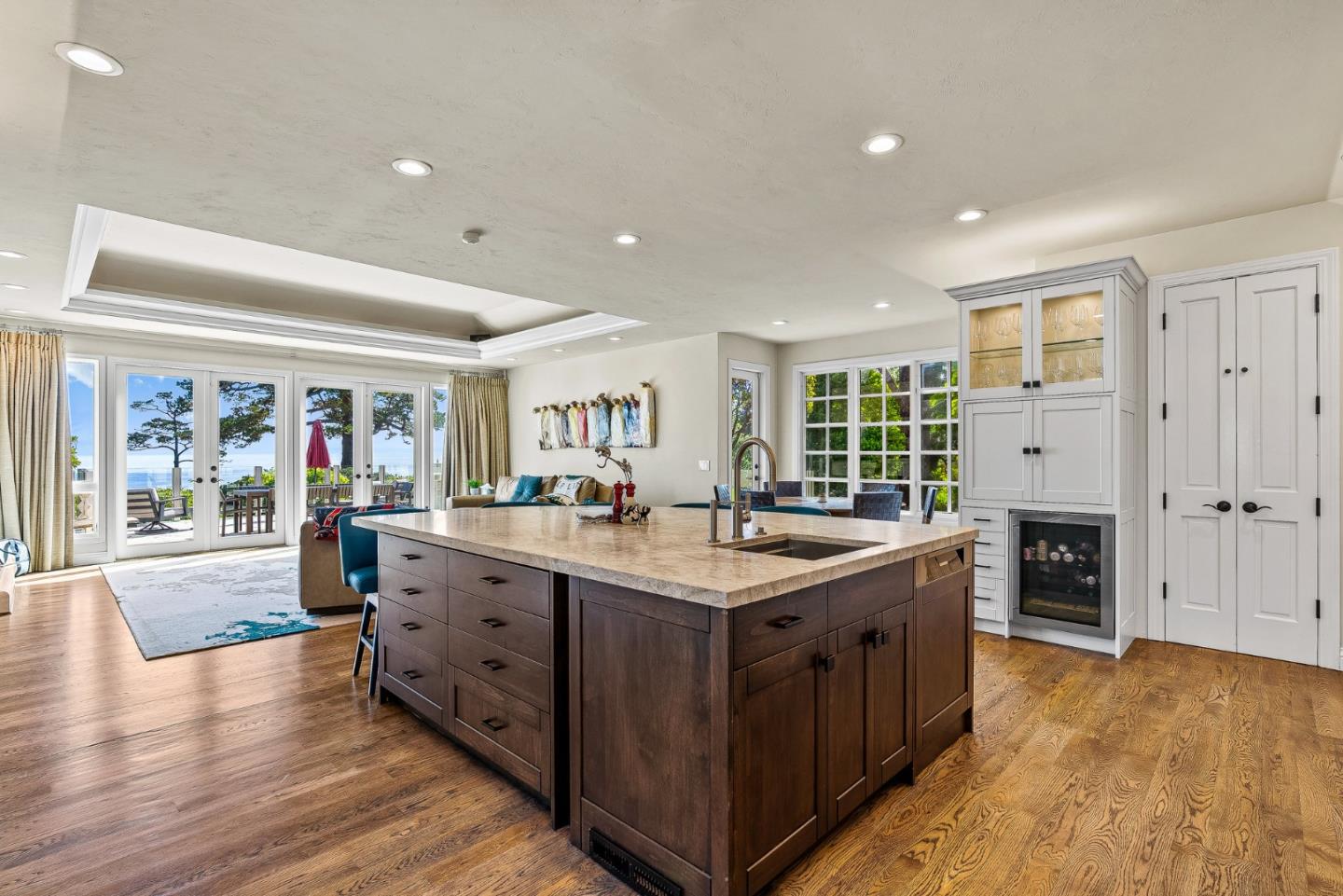 4038 Sunridge Road Pebble Beach, CA 93953 - Photo 16 of 48 a kitchen with stainless steel appliances granite countertop a stove and a large window