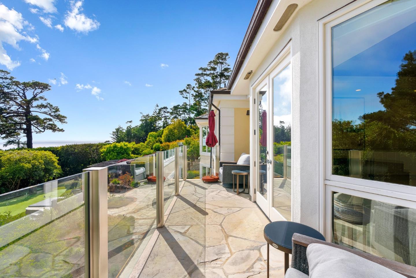 4038 Sunridge Road Pebble Beach, CA 93953 - Photo 21 of 48 a view of balcony with furniture and garden